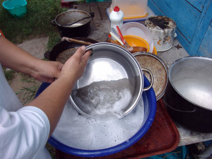 Dishes washed in basin